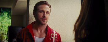 Movie still from “La La Land” (2016), directed by Damien Chazelle – A person wearing a red jacket; Close Up shot, Over the shoulder angle