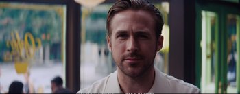 Movie still from “La La Land” (2016), directed by Damien Chazelle – A person wearing a white shirt; Close Up shot, Over the shoulder angle