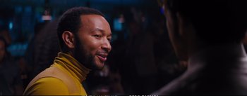 Movie still from “La La Land” (2016), directed by Damien Chazelle – A person wearing a yellow shirt; Close Up shot, Over the shoulder angle