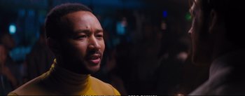 Movie still from “La La Land” (2016), directed by Damien Chazelle – A person wearing a yellow shirt; Close Up shot, Over the shoulder angle
