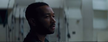 Movie still from “La La Land” (2016), directed by Damien Chazelle – A person looking at something; Close Up shot, Over the shoulder angle