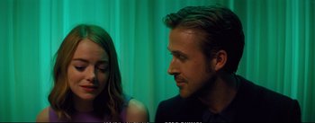 Movie still from “La La Land” (2016), directed by Damien Chazelle – A man and a woman looking at one another; Close Up shot, Over the shoulder angle