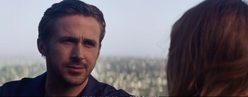 Movie still from “La La Land” (2016), directed by Damien Chazelle – A man and a woman looking at each other; Close Up shot, Over the shoulder angle