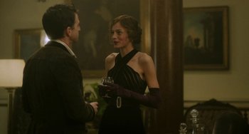 Movie still from “Lady Chatterley's Lover” (2022), directed by Laure de Clermont-Tonnerre – A man and a woman are talking to each other; Medium shot, Over the shoulder angle