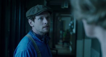 Movie still from “Lady Chatterley's Lover” (2022), directed by Laure de Clermont-Tonnerre – Close Up shot, Over the shoulder angle