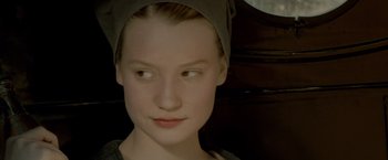 Movie still from “Lawless” (2012), directed by John Hillcoat – A person wearing a headscarf; Close Up shot, High angle