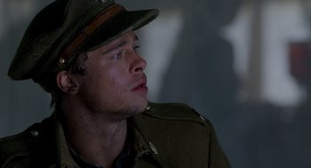 Movie still from “Legends of the Fall” (1994), directed by Edward Zwick – A man in a military uniform looking up at the sky; Close Up shot, Low angle