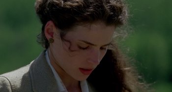 Movie still from “Legends of the Fall” (1994), directed by Edward Zwick – A woman's face with her eyes closed; Close Up shot, High angle