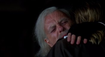 Movie still from “Legends of the Fall” (1994), directed by Edward Zwick – An old man with white hair is brushing his teeth; Close Up shot, Over the shoulder angle