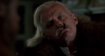 Movie still from “Legends of the Fall” (1994), directed by Edward Zwick – An older man with a cigarette in his mouth; Close Up shot, Low angle