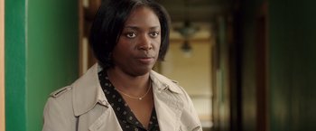 Movie still from “Lights Out” (2016), directed by David F. Sandberg – A person wearing a jacket; Close Up shot, Over the shoulder angle