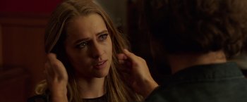 Movie still from “Lights Out” (2016), directed by David F. Sandberg – A woman getting her hair cut by a stylist; Close Up shot, Over the shoulder angle