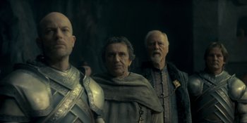 Movie still from “House of the Dragon” (2022), created by George R.R. Martin – Medium shot, Low angle