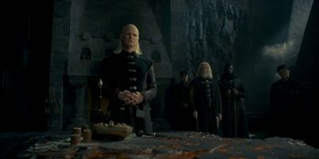 Movie still from “House of the Dragon” (2022), created by George R.R. Martin – Medium shot, Low angle