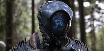 Movie still from “Lost in Space” (2018), created by Irwin Allen – A person's face with a helmet on; Close Up shot, Over the shoulder angle