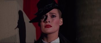 Movie still from “Indiana Jones and the Last Crusade” (1989), directed by Steven Spielberg – A person wearing a hat; Close Up shot, Low angle