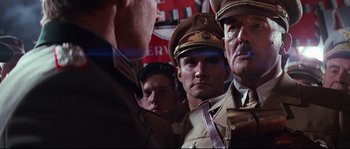 Movie still from “Indiana Jones and the Last Crusade” (1989), directed by Steven Spielberg – A group of men in military uniforms standing next to each other; Close Up shot, Low angle