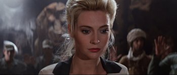 Movie still from “Indiana Jones and the Last Crusade” (1989), directed by Steven Spielberg – A person with a nose ring; Close Up shot, Over the shoulder angle