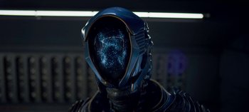 Movie still from “Lost in Space” (2018), created by Irwin Allen – The face of a robot; Close Up shot, High angle