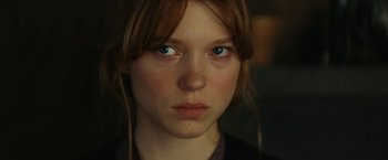 Movie still from “Inglourious Basterds” (2009), directed by Quentin Tarantino – A person with blue eyes; Close Up shot, Over the shoulder angle