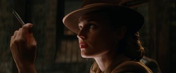 Movie still from “Inglourious Basterds” (2009), directed by Quentin Tarantino – A person wearing a hat and looking up; Close Up shot, Low angle