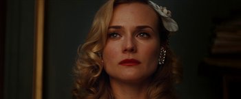 Movie still from “Inglourious Basterds” (2009), directed by Quentin Tarantino – A person wearing a dress; Close Up shot, Low angle