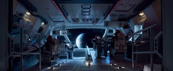 Movie still from “Lost in Space” (2018), created by Irwin Allen – A view of the earth from inside a space ship; Extreme Wide shot, High angle