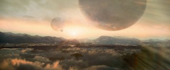 Movie still from “Lost in Space” (2018), created by Irwin Allen – An image of an alien landscape with mountains in the background; Extreme Wide shot, High angle