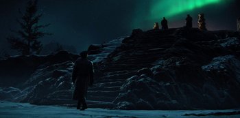 Movie still from “Love, Death & Robots” (2019), created by Tim Miller – Two people are standing on a set of stairs; Extreme Wide shot, Low angle