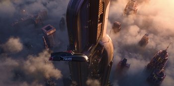 Movie still from “Love, Death & Robots” (2019), created by Tim Miller – An aerial view of a police car flying over a city; Extreme Wide shot, Overhead angle