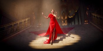 Movie still from “Love, Death & Robots” (2019), created by Tim Miller – A woman in a red dress standing on steps; Wide shot, Low angle