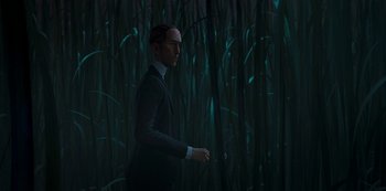 Movie still from “Love, Death & Robots” (2019), created by Tim Miller – A man in a suit holding a cane in a field; Medium shot, Low angle