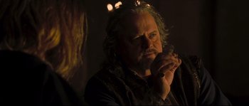 Movie still from “Kingdom of Heaven” (2005), directed by Ridley Scott – A person with a beard and long white hair; Close Up shot, Over the shoulder angle