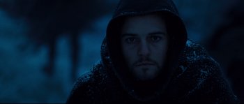 Movie still from “Kingdom of Heaven” (2005), directed by Ridley Scott – A person wearing a hooded jacket; Close Up shot, Low angle
