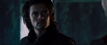 Movie still from “Kingdom of Heaven” (2005), directed by Ridley Scott – A person with long hair; Close Up shot, Low angle