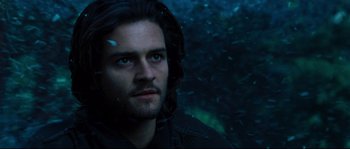 Movie still from “Kingdom of Heaven” (2005), directed by Ridley Scott – A person with long dark hair; Close Up shot, Low angle