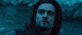 Movie still from “Kingdom of Heaven” (2005), directed by Ridley Scott – A person with long black hair; Close Up shot, Low angle