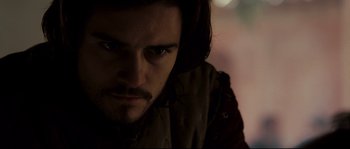 Movie still from “Kingdom of Heaven” (2005), directed by Ridley Scott – A person with long hair; Close Up shot, Over the shoulder angle