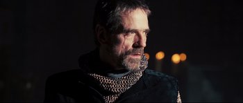 Movie still from “Kingdom of Heaven” (2005), directed by Ridley Scott – A person wearing a chain mail scarf; Close Up shot, Low angle