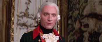 Movie still from “Amadeus” (1984), directed by Milos Forman – A person wearing a costume; Close Up shot, High angle
