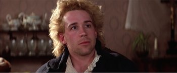 Movie still from “Amadeus” (1984), directed by Milos Forman – A person with long hair; Close Up shot, Low angle