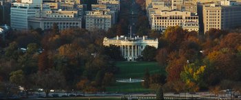 Movie still from “Kingsman: The Secret Service” (2014), directed by Matthew Vaughn – The white house sits in the middle of a city; Extreme Wide shot, High angle