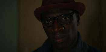 Movie still from “Lupin” (2021), created by Tigran Rosine – Close Up shot, Low angle