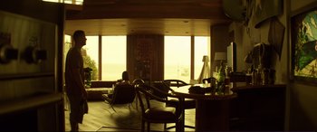 Movie still from “Magic Mike” (2012), directed by Steven Soderbergh – A living room filled with lots of furniture and large windows; Wide shot, High angle