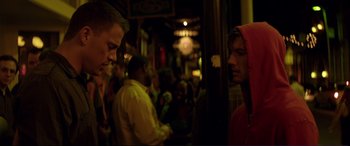 Movie still from “Magic Mike” (2012), directed by Steven Soderbergh – A group of people standing in a room; Close Up shot, Over the shoulder angle