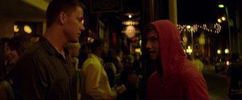 Movie still from “Magic Mike” (2012), directed by Steven Soderbergh – A man in a red jacket talking to a man in a red jacket; Close Up shot, Over the shoulder angle