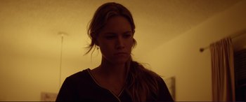 Movie still from “Magic Mike” (2012), directed by Steven Soderbergh – A woman with long blonde hair is looking at the camera; Close Up shot, Low angle