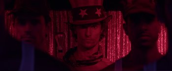 Movie still from “Magic Mike” (2012), directed by Steven Soderbergh – A man wearing a hat with stars on it; Close Up shot, Over the shoulder angle