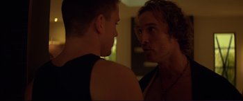 Movie still from “Magic Mike” (2012), directed by Steven Soderbergh – Two young men are looking at one another in the mirror; Close Up shot, Over the shoulder angle