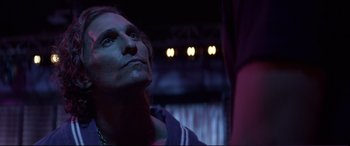 Movie still from “Magic Mike” (2012), directed by Steven Soderbergh – A man looking up into the sky at night; Close Up shot, Over the shoulder angle